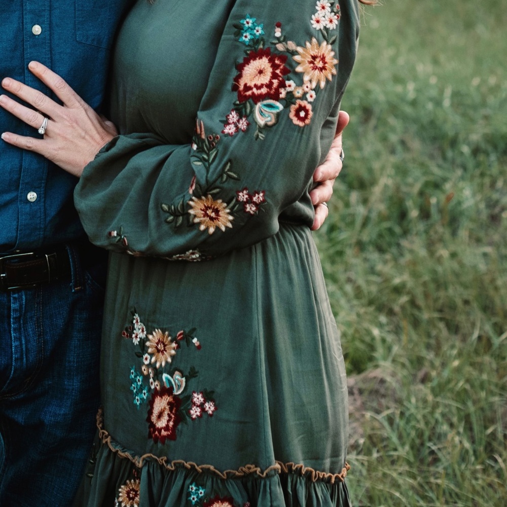 Beautiful dark green, fall dress with multi colored flowers.